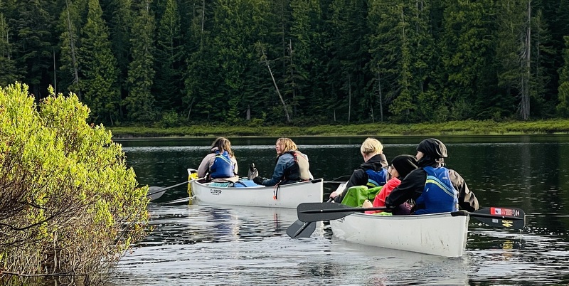 on the river in our canoes