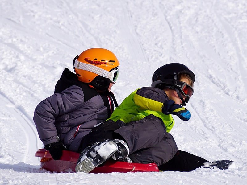 children sledding in victoria bc
